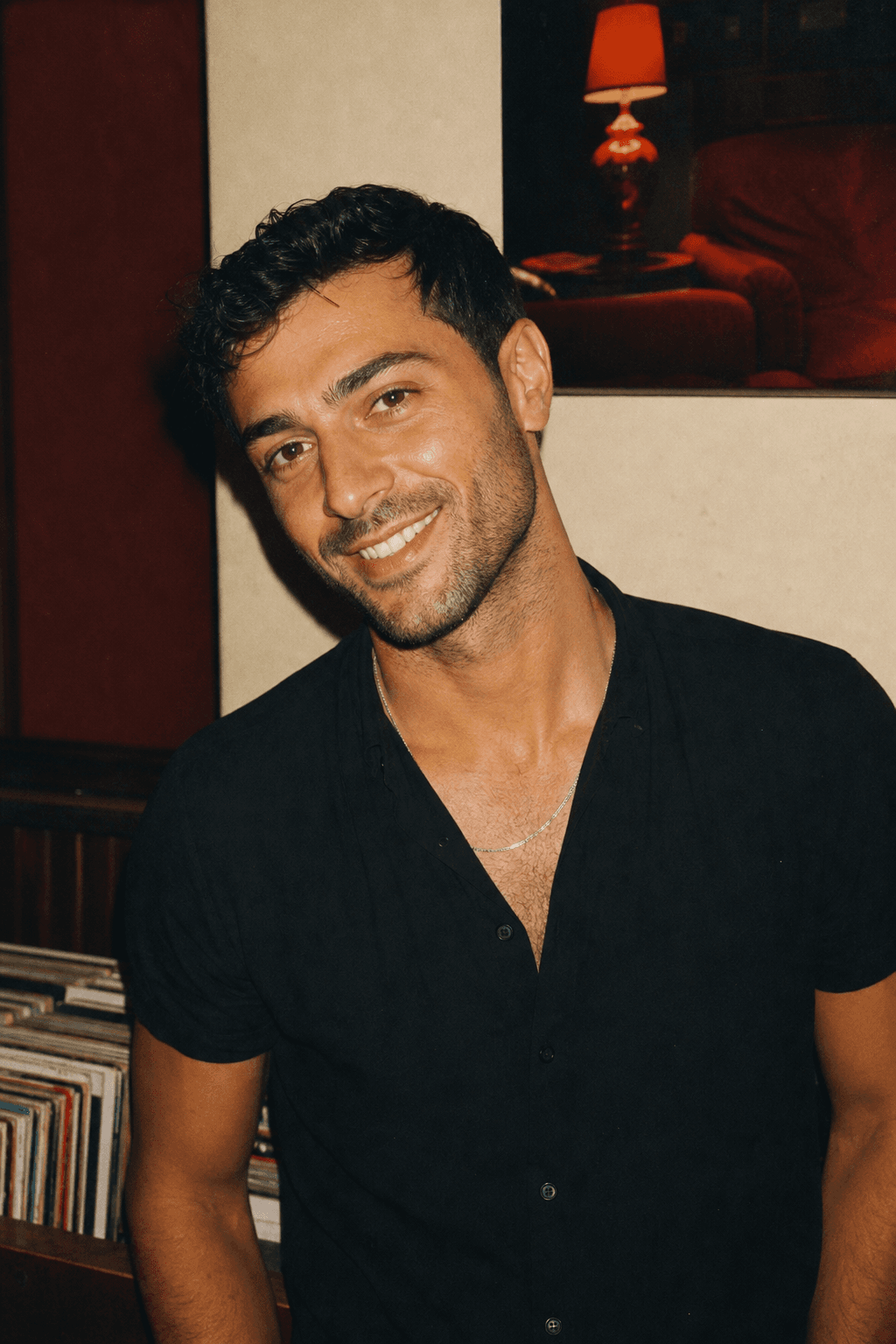 A man sharing a relaxed smile